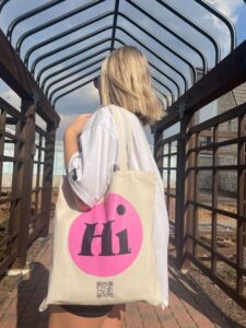 pink Hi tote bag at Kansas State University