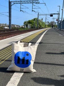 dark blue Hi tote bag by railway track in Scotland